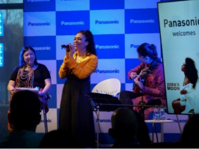 Photo: Candice Hoyes singing on stage