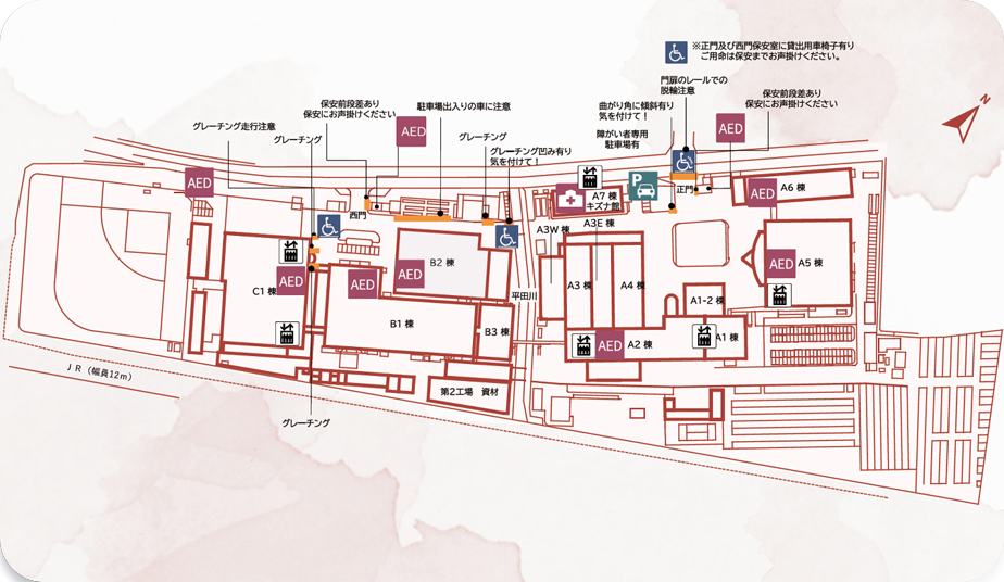車いすの走行に注意すべき箇所やAEDの位置などが記号で記されたパナソニックのある構内のアクセシビリティマップ。