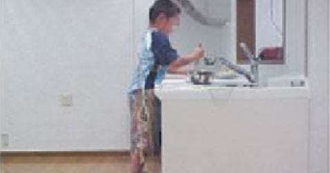 photo: Children testing a washstand