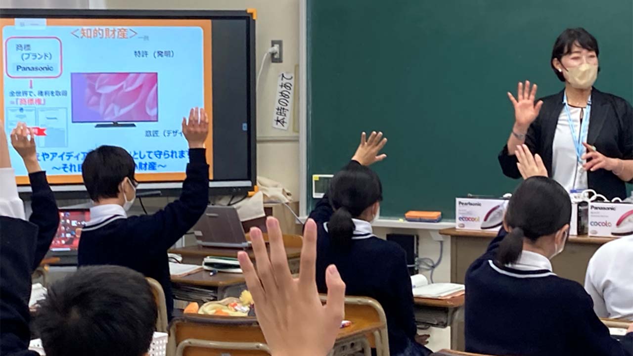 Outreach classroom program. A student raises his hand.