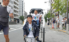 Photo: Riding on a rickshaw around Asakusa streets