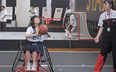Photo: Trying wheelchair basketball