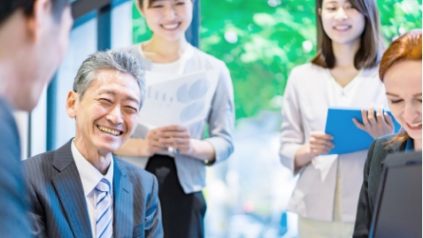 Photo: Image of a person in a suit, building a new career outside the company after retirement