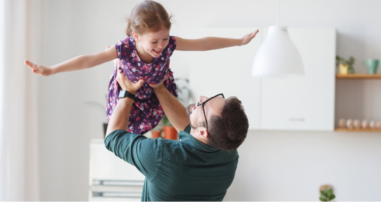 Photo: Image of an employee raising a child at home