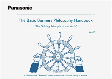 Image: Cover of the Basic Business Philosophy Handbook for 2021. Illustration of a captain’s hands at the helm of a ship