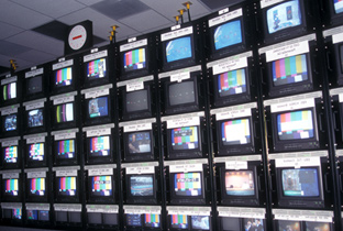 Photo: Images being shown on multiple monitors installed at the International Broadcast Center (IBC)