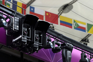 Photo: Compact DLP projectors installed alongside lighting equipment at a venue of the Olympic Games London 2012