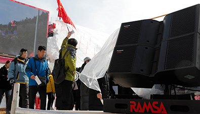 Photo of multiple RAMSA line-array speakers installed together at the PyeongChang 2018 Winter Games ski competition venue