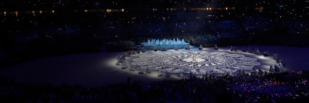 Photo: Panoramic view of geometric patterns being projected on the stadium's ground using DLP projectors at the closing ceremony of the Olympic Games Rio 2016