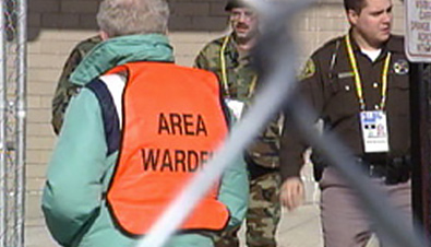 Photo: Security guards and staff wearing their ID cards around their necks at one of the construction sites