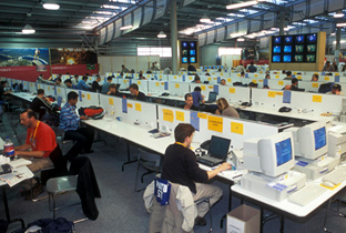 Photo: Staff working at the International Broadcast Center (IBC)