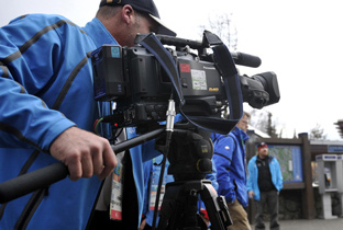Photo: Cameraperson using an HD camera recorder